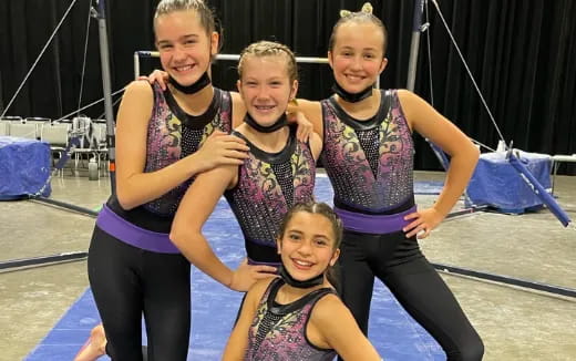 a group of people posing for the camera