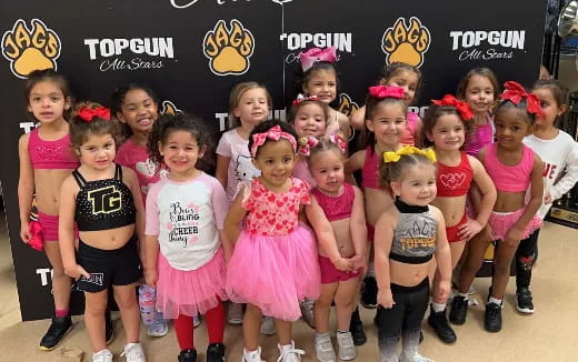 a group of children posing for a photo