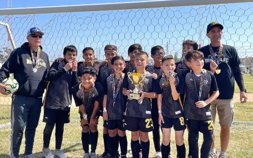 a group of people posing for a photo