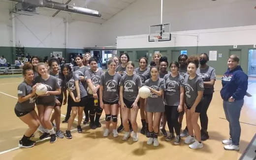 a group of people posing for a photo