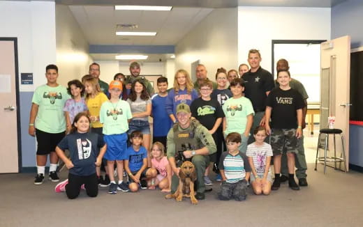 a group of people posing for a photo