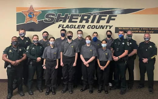 a group of people posing for a photo