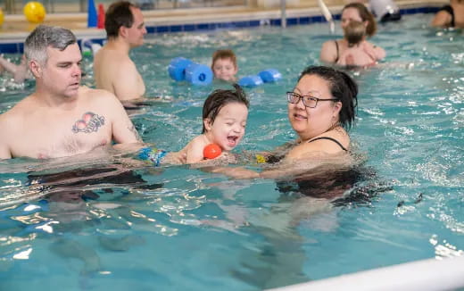 a group of people in a pool