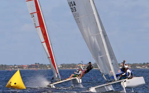 a group of people on a sailboat