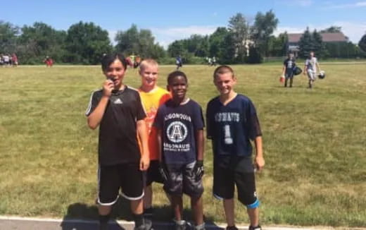 a group of boys posing for a picture