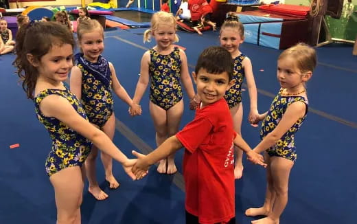 a group of children in a pool