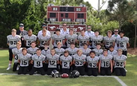 a group of people wearing sports uniforms