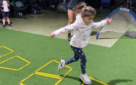 a girl playing tennis