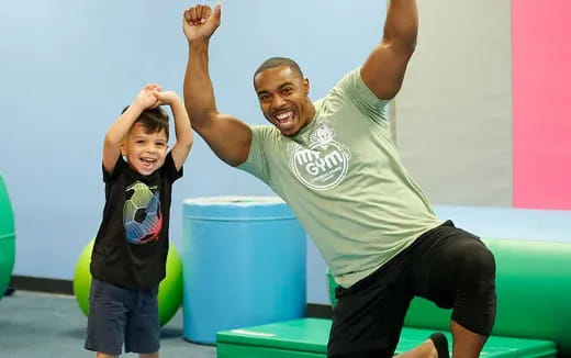 a woman and a girl posing for a picture