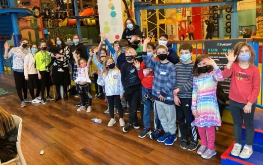 a group of children in a room