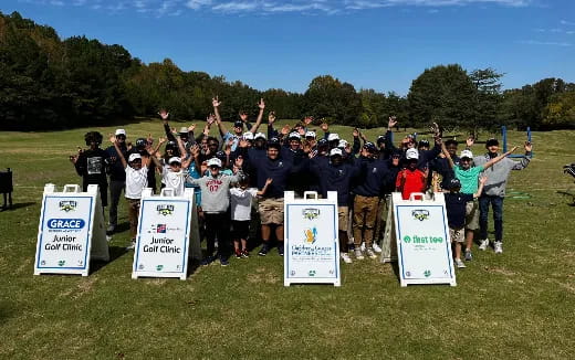 a group of people holding signs