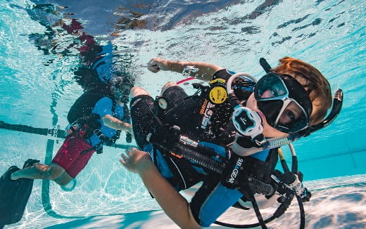 a group of people in scuba gear