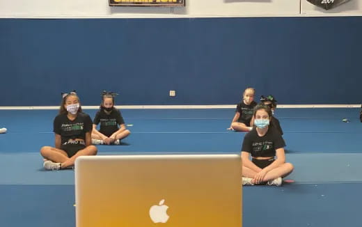 a group of people wearing masks