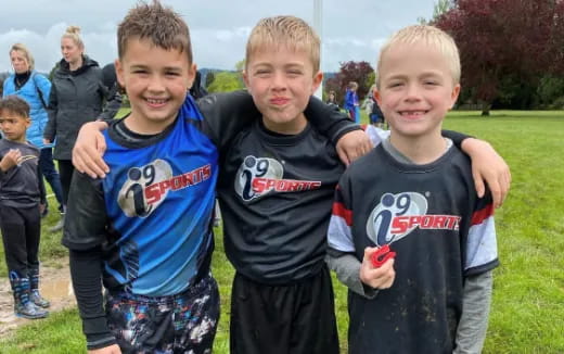 a group of boys posing for a picture