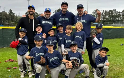 a group of kids posing for a photo