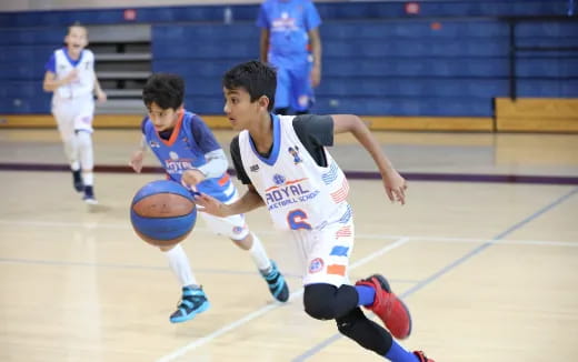 a couple of boys playing football