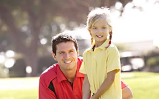 a man and a woman smiling