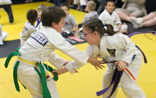 a group of people in white uniforms