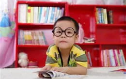 a boy wearing glasses