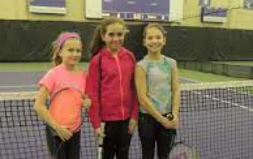 a group of girls posing for a picture