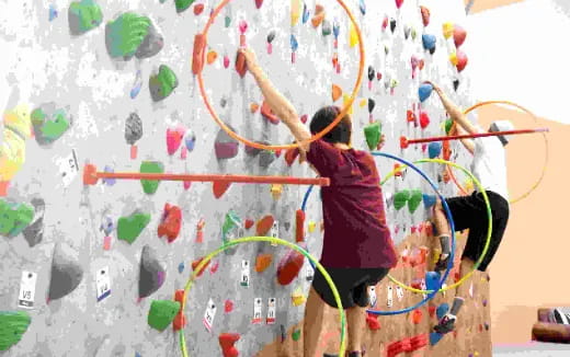 a person climbing a wall