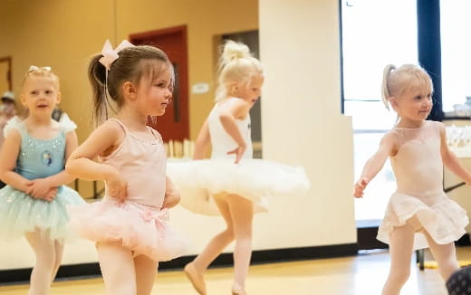 a group of girls dancing