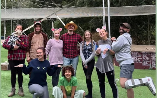 a group of people posing for a photo