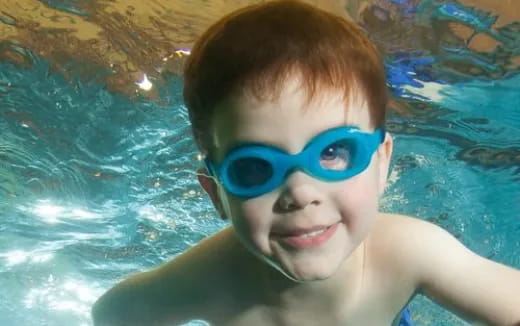 a boy wearing goggles