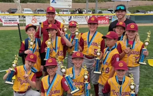 a group of people wearing matching outfits