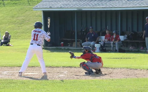 a baseball player swinging a bat