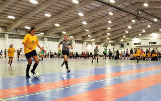 a group of people playing football
