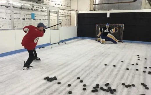 a man playing hockey
