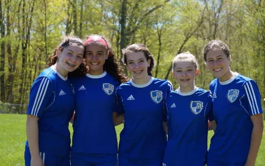 a group of people wearing football uniforms