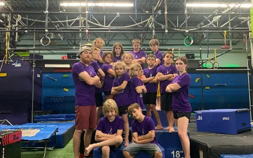 a group of people posing for a photo