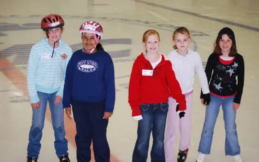a group of people wearing helmets