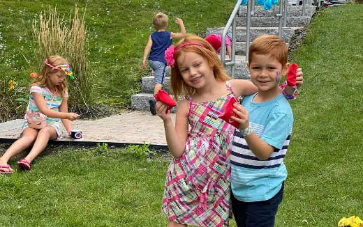 a group of children playing with toys
