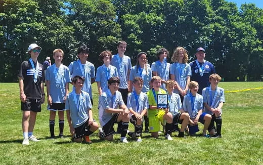 a group of people posing for a photo