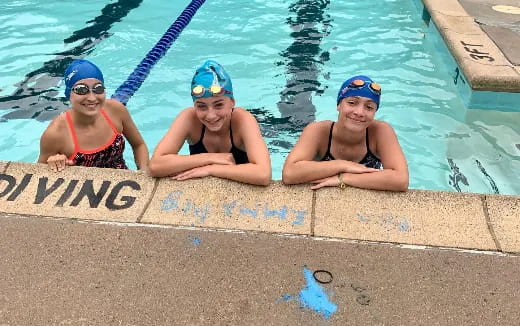 a group of women in a pool