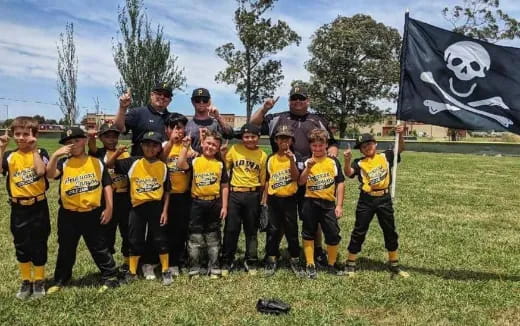 a group of people in yellow shirts