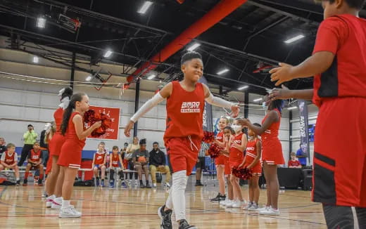 a group of people in a gym