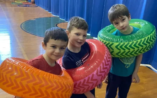 a group of boys posing for a picture