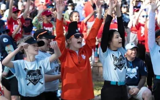 a group of people cheering