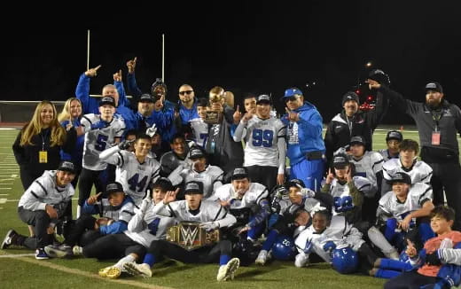 a group of people posing for a photo