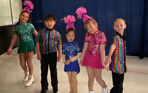 a group of children wearing clothing