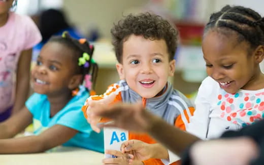 a group of children smiling