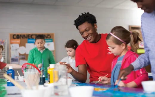 a teacher teaching her students