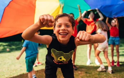 a boy holding a flag