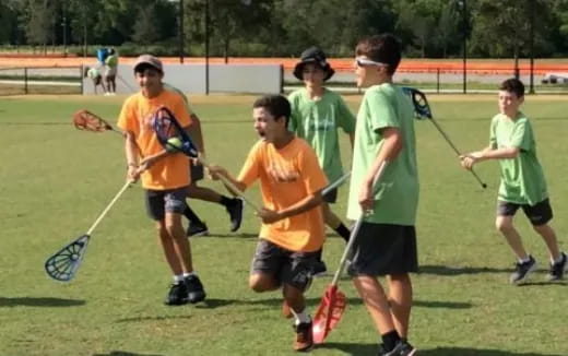 a group of people playing a sport