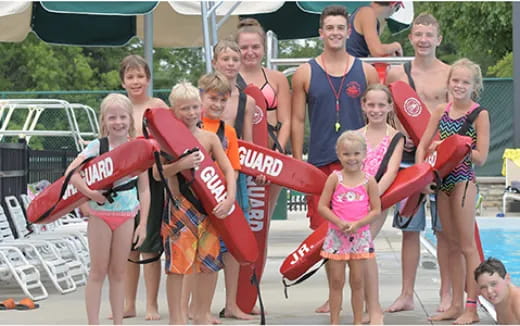 a group of people posing for a photo