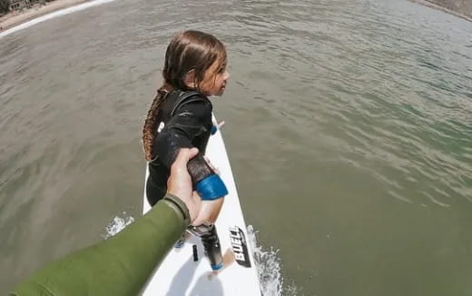 a person on a surfboard